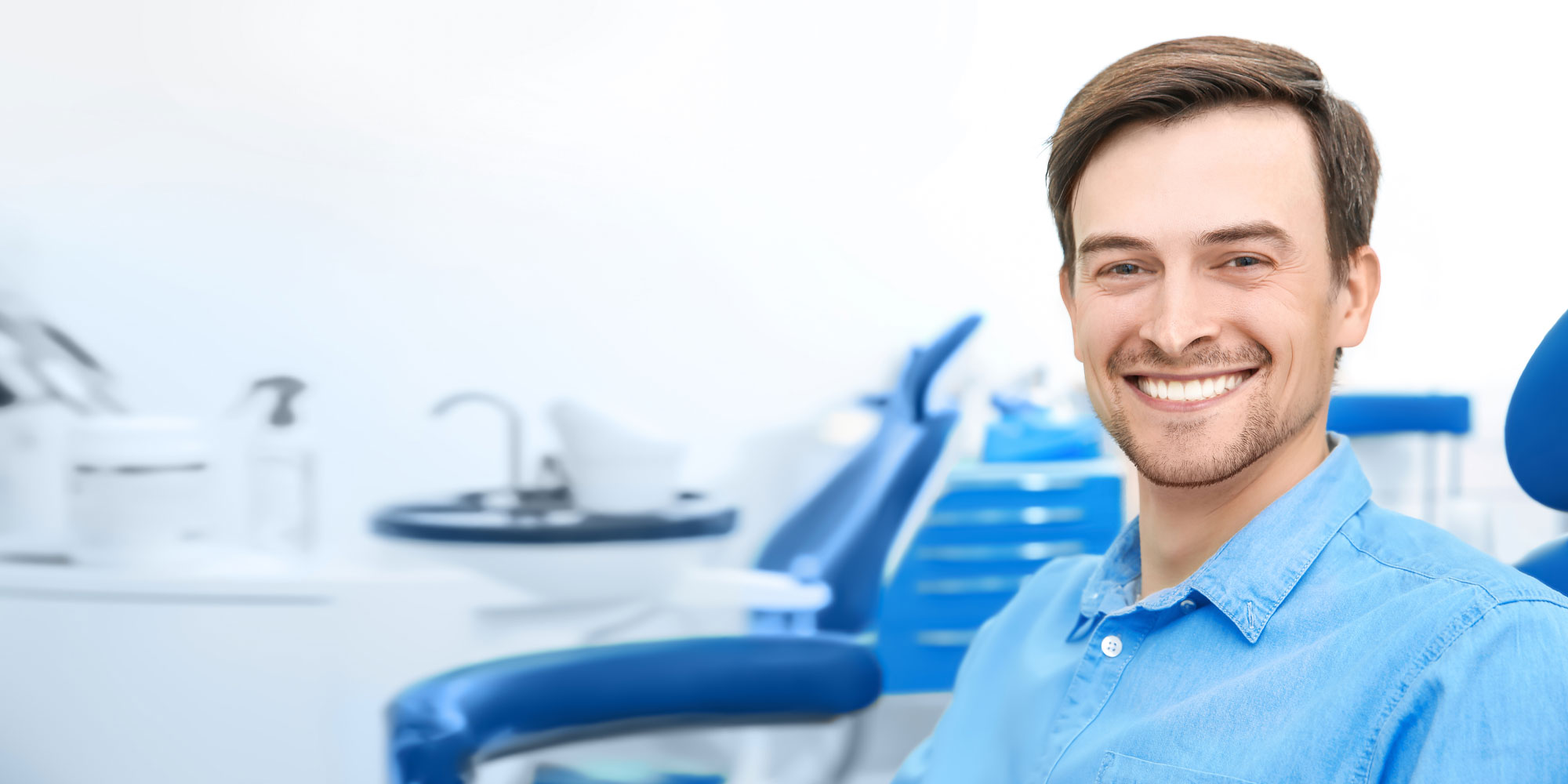 dental patient smiling after procedure.