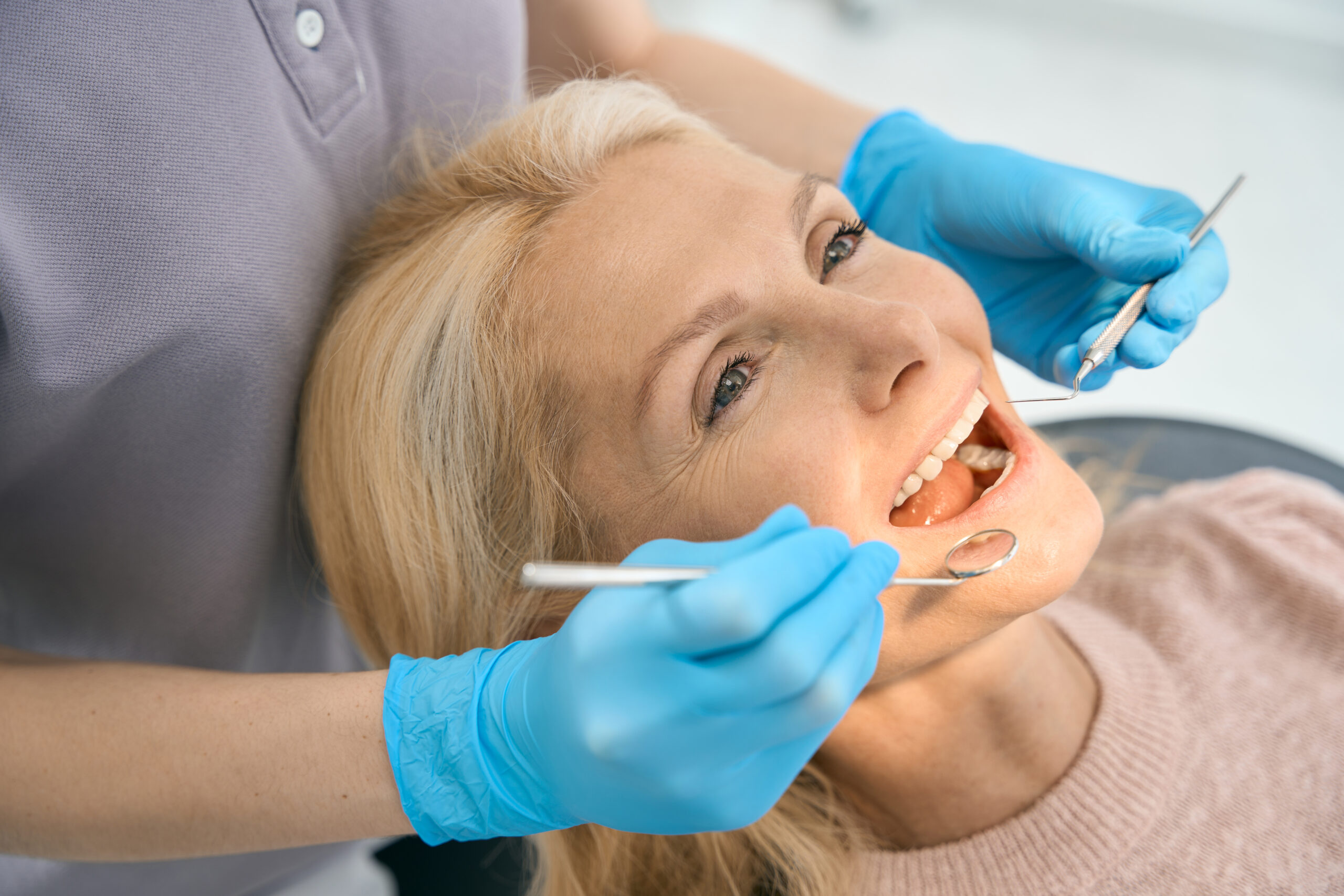 an image of a woman with gum recession.